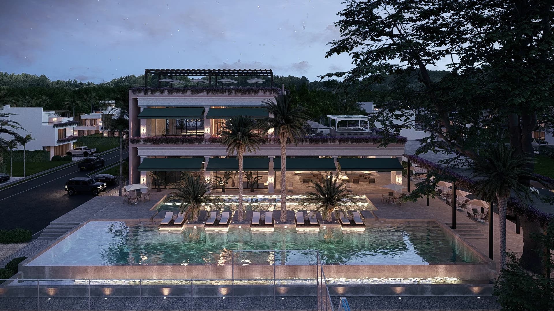 Piscina y club house de Bonavento iluminados en la noche