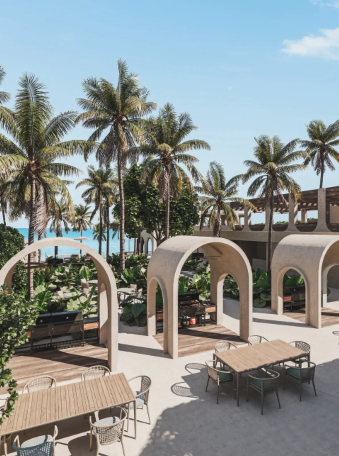 Beach House con arcos, comedores al aire libre y palmeras frente al mar